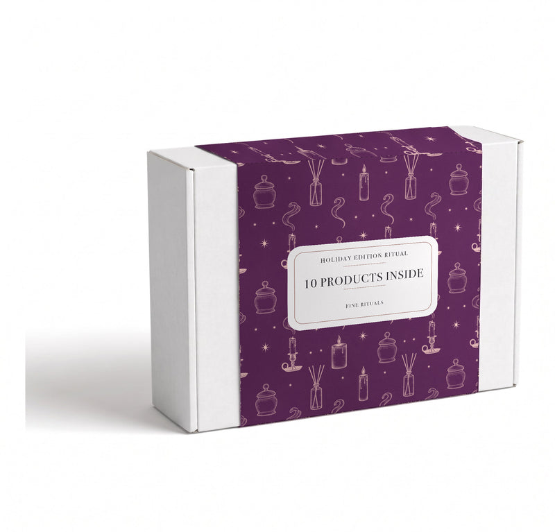 The Holiday Premium Ritual — sealed Fine Rituals gift box with candle and spa engravings, 10 products inside